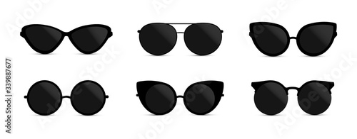 Set of fashionable black sunglasses on white background 