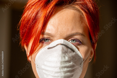 face of a woman in medical face mask