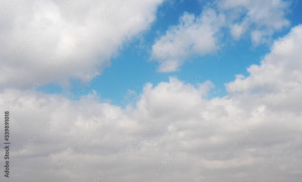 clouds swiftly swim through the blue sky of the day clouds swiftly swim through the blue sky of the day