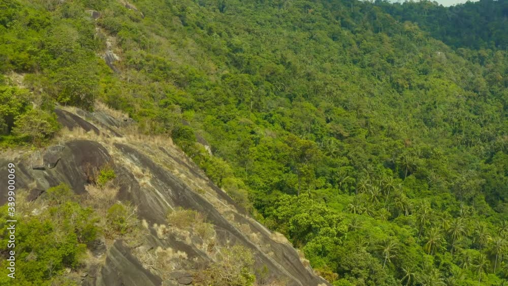 Video from a drone on samui island where you can see the beach road car people home rock mountain and palm trees with beautiful sea and ocean views in Siam Gulf of Thailand in excellent quality 4К Video from a drone on samui island where you can see the beach road car people home rock mountain and palm trees with beautiful sea and ocean views in Siam Gulf of Thailand in excellent quality 4К