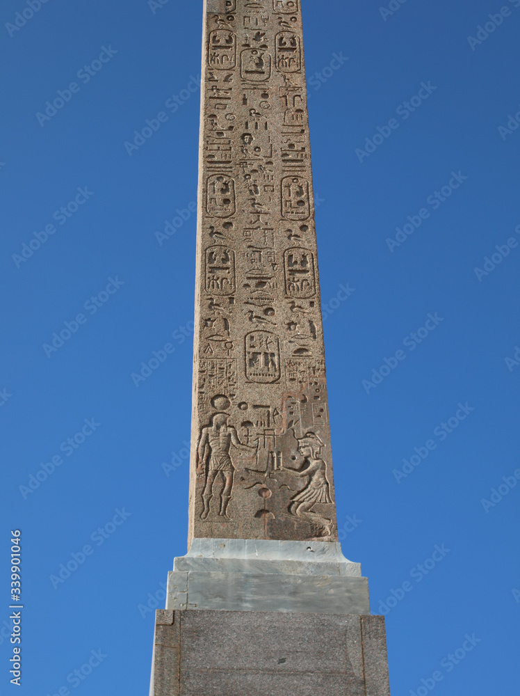 ancient egyptian obelisk with engraved hieroglyphics