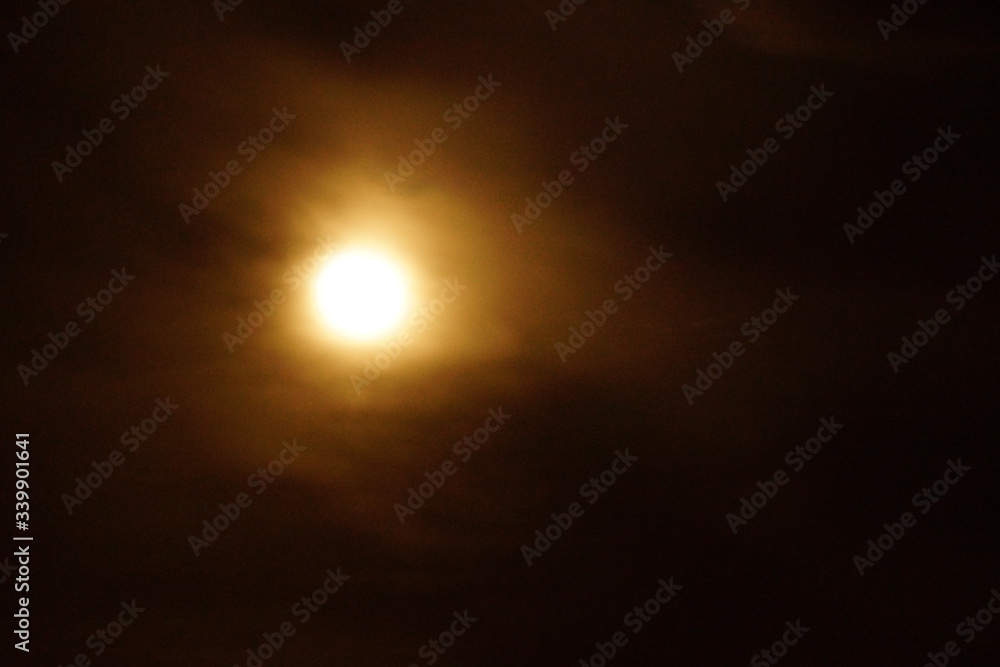 Supermoon pink full moon 8 April 2020 in France. It occurs when the full moon is at its closest point to the Earth in its monthly orbit. Full moon. A huge moon. Supermoon pink full moon 8 April 2020 in France. It occurs when the full moon is at its closest point to the Earth in its monthly orbit. Full moon. A huge moon.