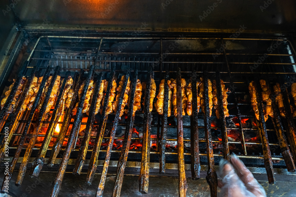 Barbecue cooking on fire the ingredient of "bun cha", the famous