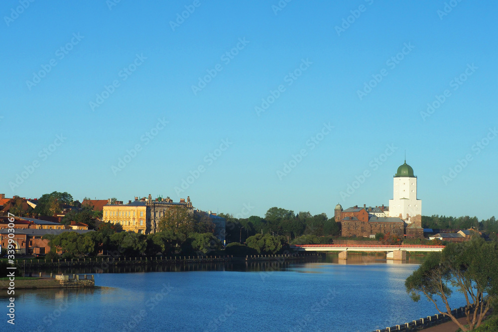 Vyborg Bay. Embankment with ancient beautiful buildings, Saint Olav tower, city Vyborg, Russia