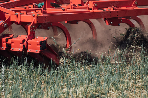 the process of cultivating the soil with the plow during plowing test drive the tractor