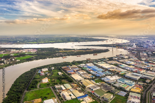 Top view aerial of Saigon river and container harbor in Tan Thuan Export Processing Zone. Ho Chi Minh City, Vietnam 