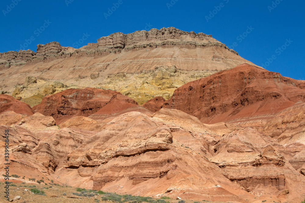 Colored, layered mountains of Aktau in the reserve of Kazakhstan.