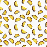 Beautiful bright pattern of ripe  pineapple slices on a white background.