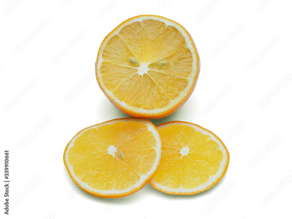 Lemon cut into slices. Isolated on a white background with a shadow
