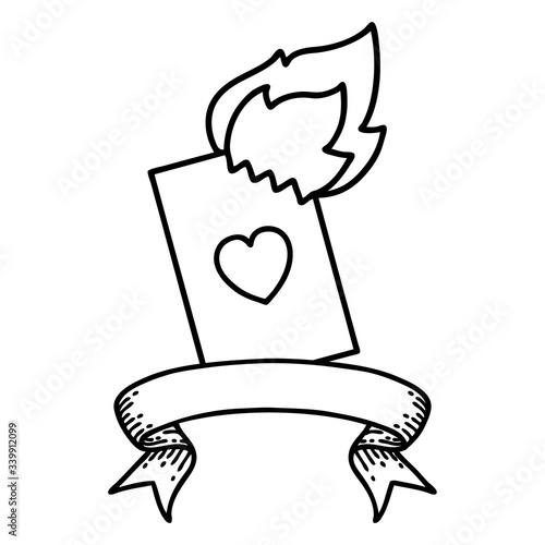black linework tattoo with banner of a flaming card
