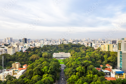 Top view aerial of Independence Palace or Reunification Palace and center Ho Chi Minh City, Vietnam with development buildings, transportation, energy power infrastructure.