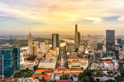 Top view aerial of People's Committee Ho Chi Minh City, with Nguyen Hue street walk, development buildings, transportation, energy power infrastructure, Financial and business centers in Vietnam