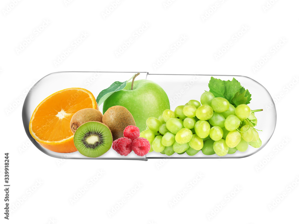 Transparent capsule with different fruits and berries rich in vitamins on white background Transparent capsule with different fruits and berries rich in vitamins on white background