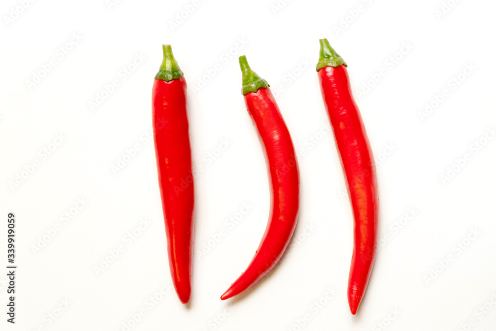 Red hot chili peppers isolated on white background.
