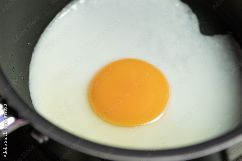Sunny side up egg on frying pan. Sunny side up egg on frying pan.