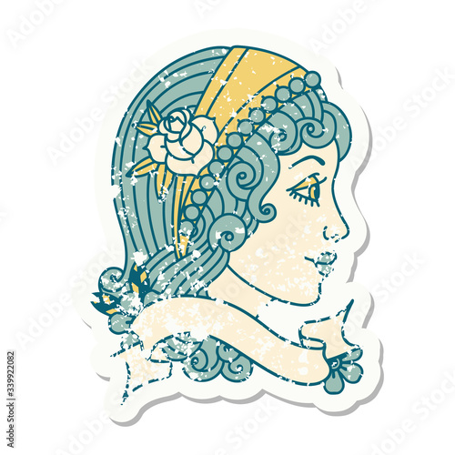 grunge sticker with banner of a gypsy head