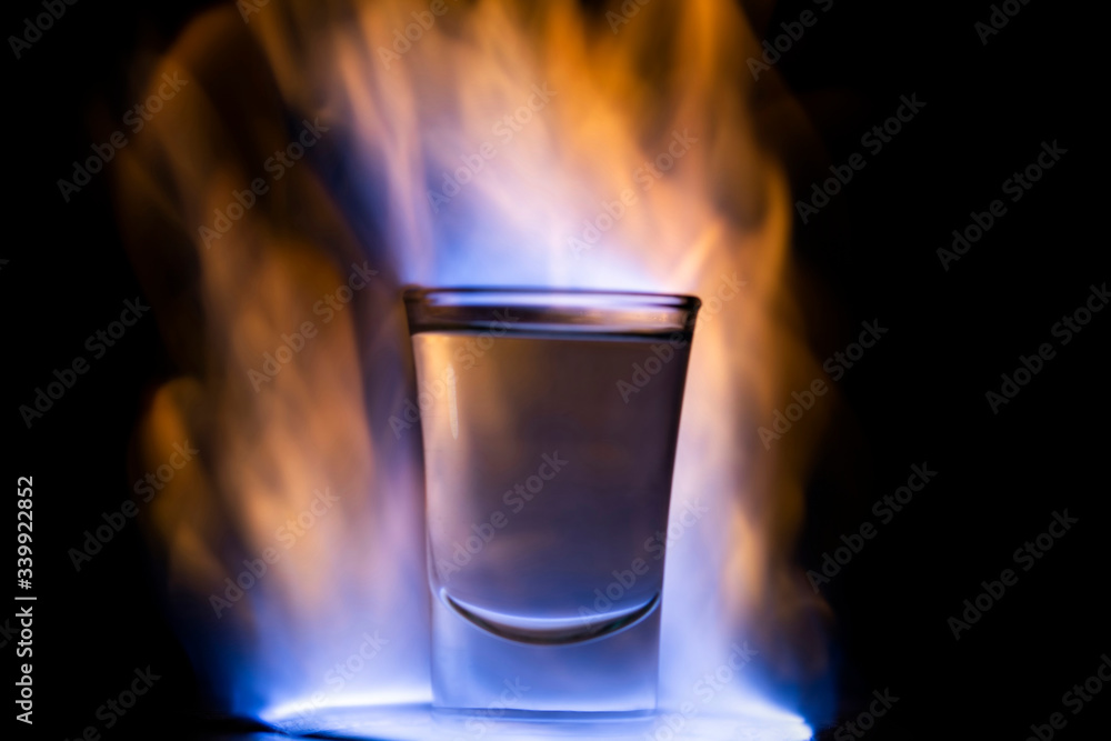 Burning drink in shot glass