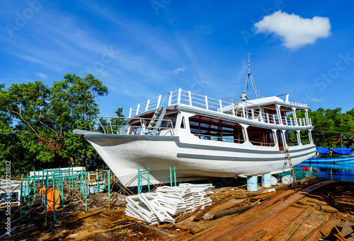 Worker in Shipyard. Shipyard industry ,( ship building) Big ship on floating dry dock in shipyard, Phu Quoc island, Kien Giang, Vietnam