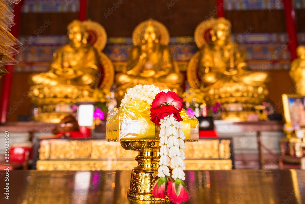 Bangkok, Thailand - March, 19, 2020 :  Flower tray of Wat Borom Racha Kanchanapisek Anusorn(Leng nuei Yee Branch 2),A popular Chinese temple to merit.