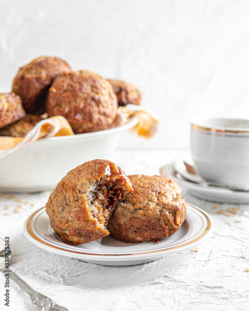 brown banana toffie muffins on a white background