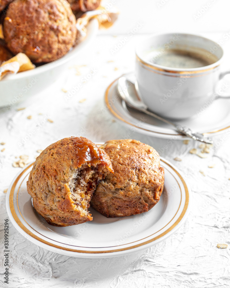 brown banana toffie muffins on a white background brown banana toffie muffins on a white background