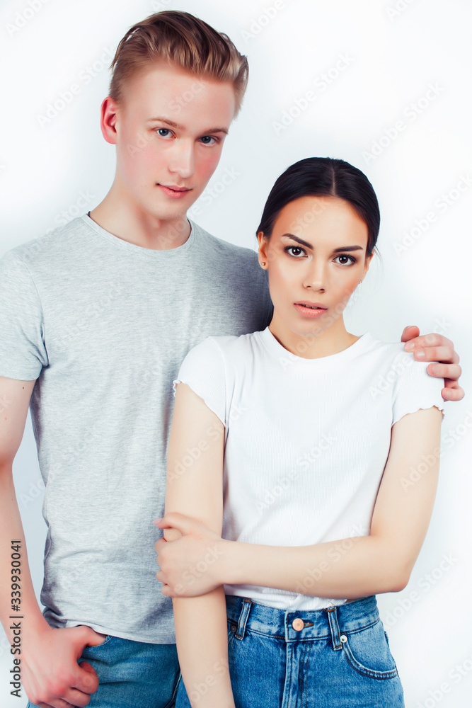 modern hipster guys together couple diverse nations, asian girl and caucasian blond boy isolated on white background, lifestyle people concept modern hipster guys together couple diverse nations, asian girl and caucasian blond boy isolated on white background, lifestyle people concept