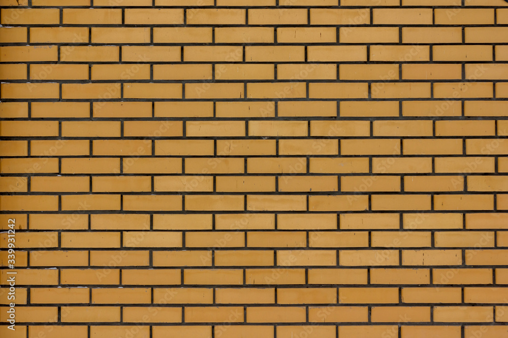 yellow new brick wall background closeup yellow new brick wall background closeup