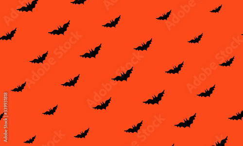 Bat halloween seamless patter with orange background. Black Bat Silhouettes on Orange Background. Vector EPS 10