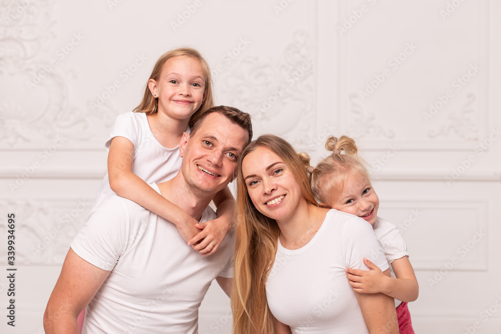 Young family gather around and smile for photo at father's day Young family gather around and smile for photo at father's day