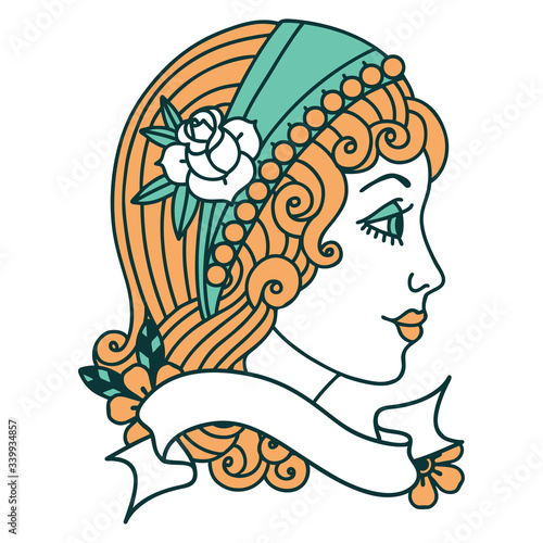 tattoo with banner of a gypsy head