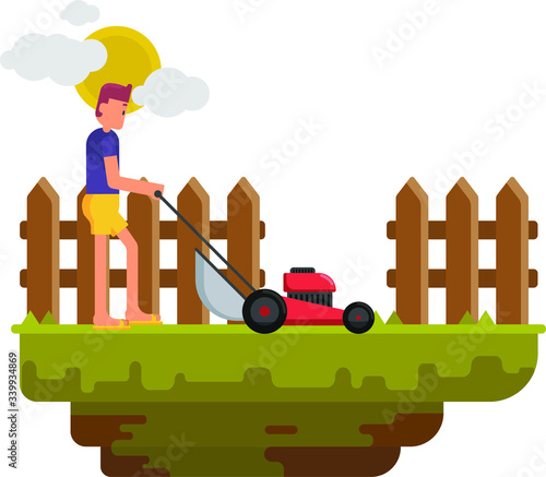 A man cutting the grass using machine