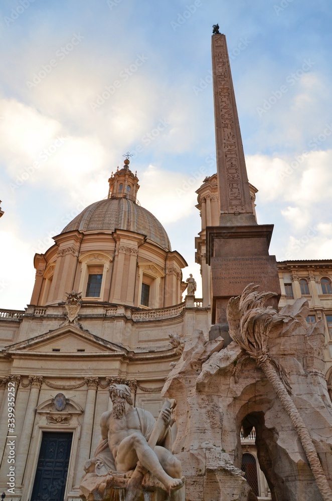Ancient obelisk and church in Rome Italy