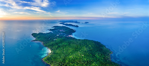 Fototapeta Naklejka Na Ścianę i Meble -  Small tropical island in the ocean. Royalty high quality free stock image aerial view of Thom island in Phu Quoc, Kien Giang, Vietnam