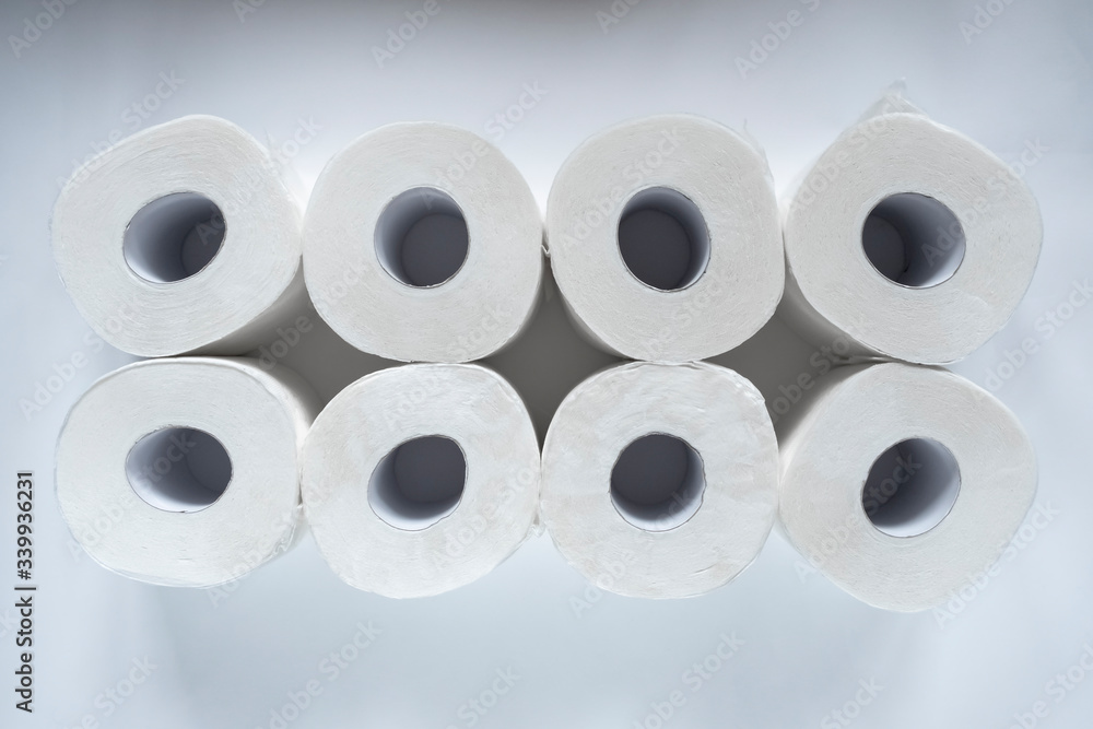 Toilet paper rolls on white backgorund. Hygiene concept. White paper texture. Household concept. Toilet paper rolls on white backgorund. Hygiene concept. White paper texture. Household concept.