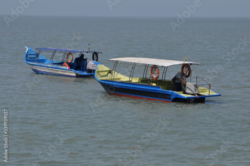 Pantai Merdeka Visitors will go to Tanjung Dawai by boat to buy anchovies, dried fish and other seafood. January 2020.Kedah.Malaysia photo