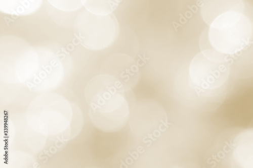 Beautiful autumn, golden, sunshine and holiday background. Sunlight bokeh close-up. Yellow texture. A subject for holidays, a birthday, a congratulation. A banner for shiny advertizing.