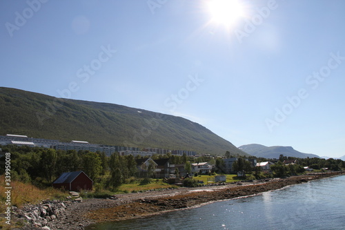 tromso tromsø water travel tourism sea coast nature port blue landscape sky harbor architecture europe boatship mountain summer bay view city beautifull and mark mediterranean vacation town