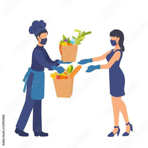 Chef cook gives take out food supply to a woman. People wear masks, protective gloves. Picking up groceries in paper bags. Food delivery.