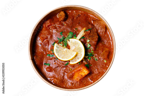 Indian Food. Indian chicken jalfrezi curry in balti dish photo