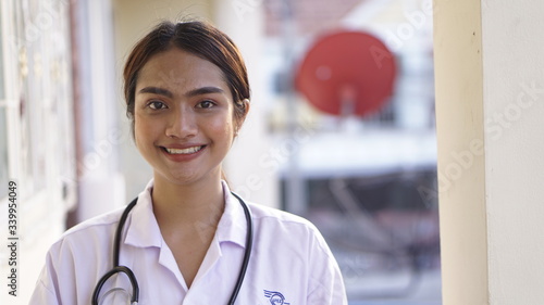 Medical physician doctor woman,Young of happy female smile face with stethoscope on blurred hospital background.                                 