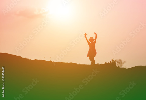 kid silhouette,Moments of the child's joy. On the Nature sunset