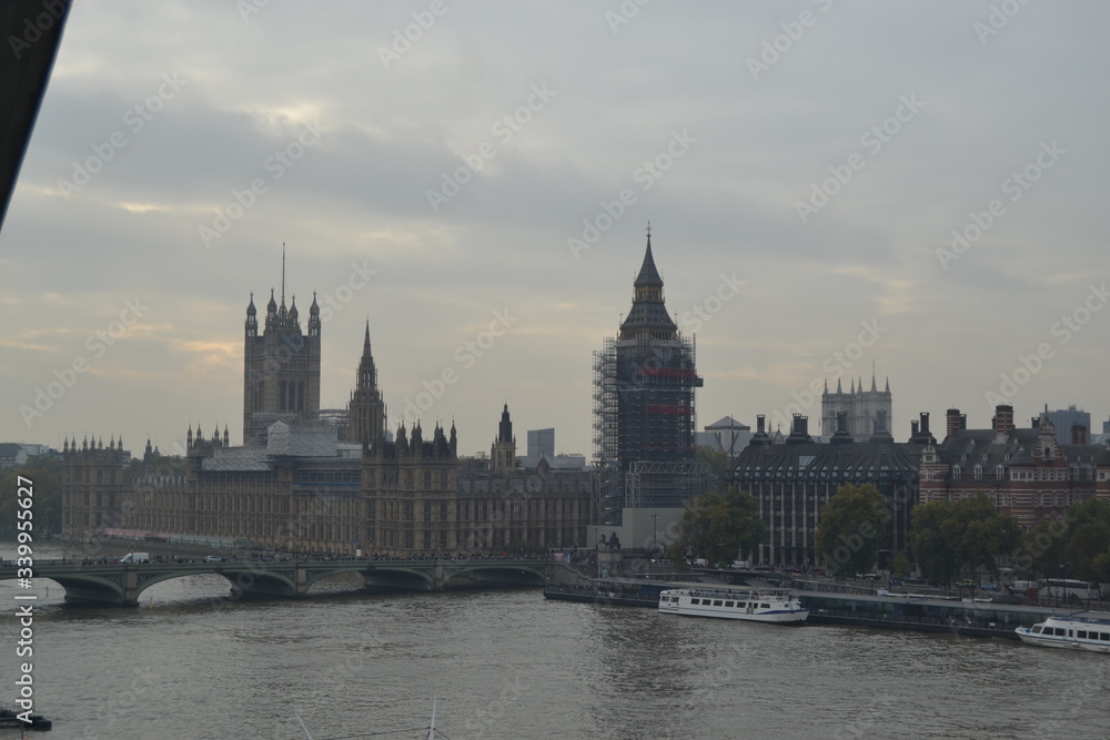Picture of the UK parliament and the world famous big ben in construction.