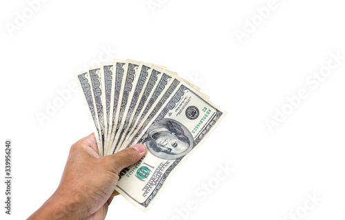 Hand holding 100 dollar bills isolated on white background money. clipping path