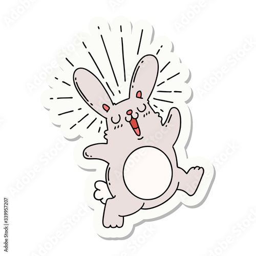 sticker of tattoo style prancing rabbit
