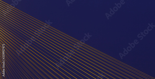 Mordern cable stayed bridge with illuminated cables. Abstract detail photo.