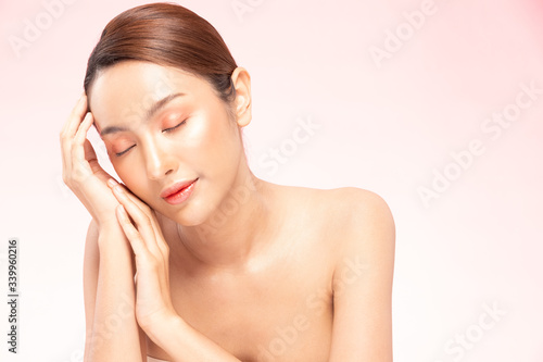 Beauty asian women touching soft chin portrait face with natural skin and skin care healthy hair and skin close up face beauty portrait.Beauty Concept on white background.