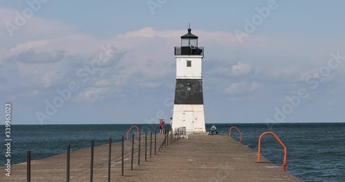 Aerie Harbor Pierhead lighthouse Pennsylvania.  Isle North Pierhead Lighthouse on shore of Lake Erie Pennsylvania. Originally built early 1800's and upgraded over the next hundred years. photo