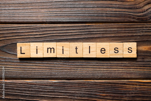 Canvas Print Limitless word written on wood block