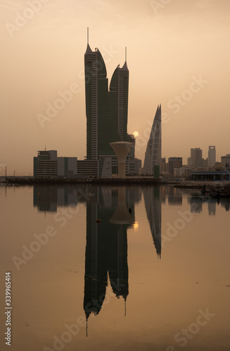 Bahrain skyline  and sunrise with iconic buildings