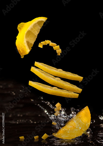 a full-sized flying lemon that is cut into pieces and thrown into the water. photo